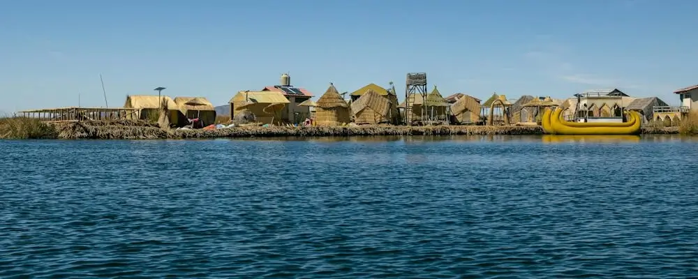 Visitors enjoying cultural experiences on the islands of Lake Titicaca | Andean Travel Experience Visitors enjoying cultural experiences on the islands of Lake Titicaca | Andean Travel Experience