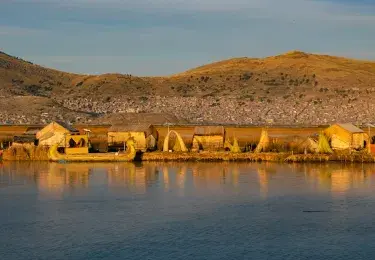 Panoramic view of Lake Titicaca, the world's highest navigable lake, located between Peru and Bolivia | Andean Travel Experience Panoramic view of Lake Titicaca, the world's highest navigable lake, located between Peru and Bolivia | Andean Travel Experience